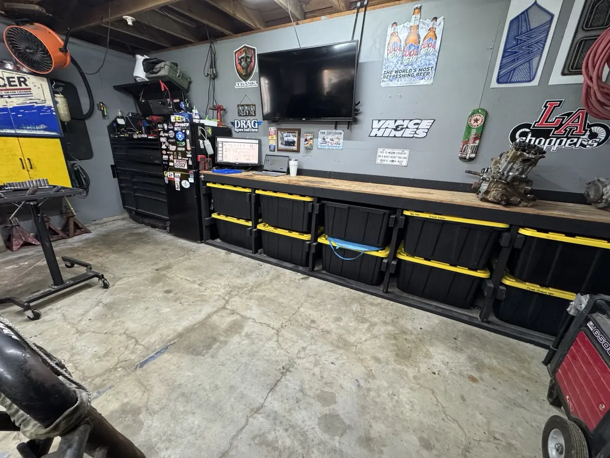 Multiple side-by-sides being serviced inside the South Coast Offroad shop